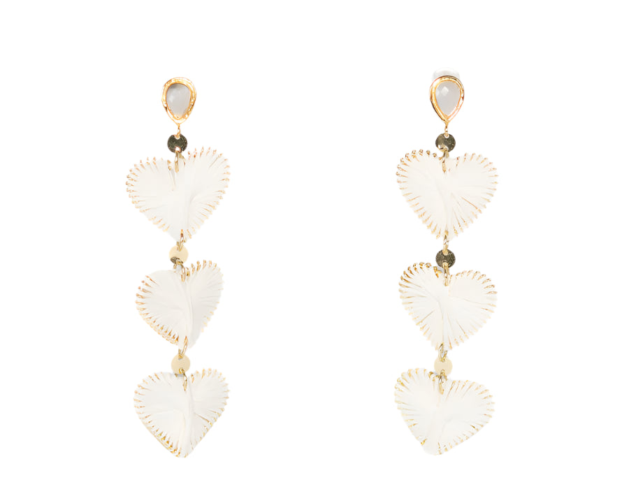 Heart-shaped earrings with gold accents on a white background