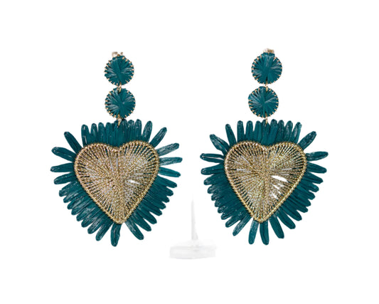 Teal heart-shaped earrings on a white background